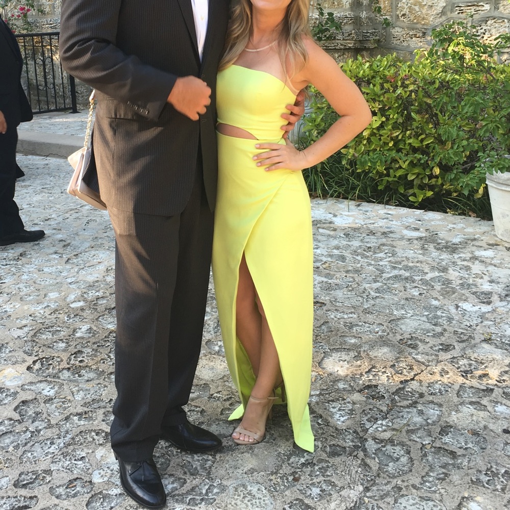 Neon green Maxi evening gown w/high leg slit. Mesh straps &stomach cut out